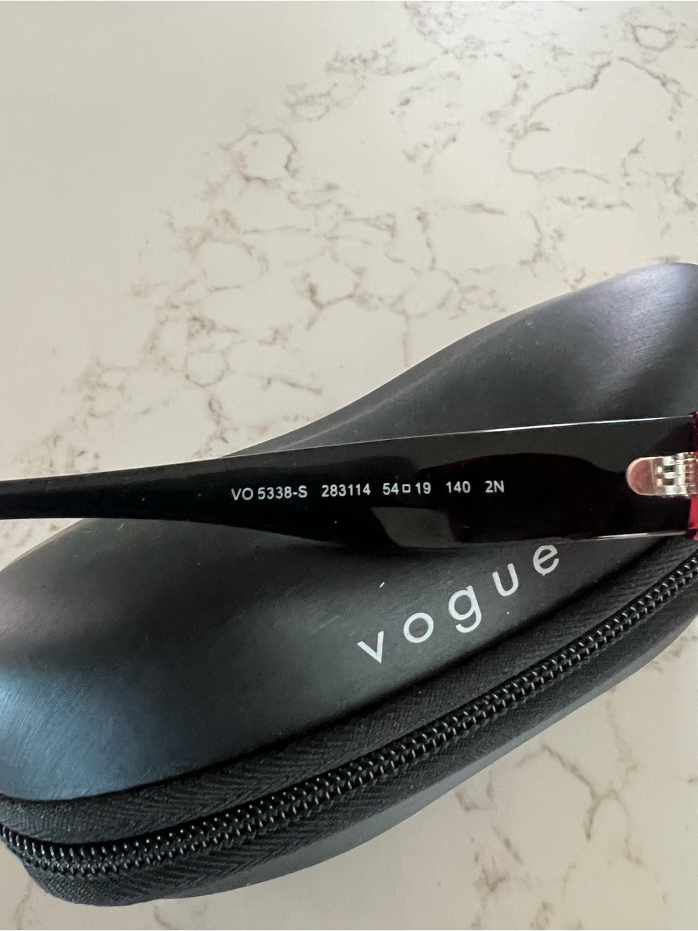 Vogue Black Sunglasses with Subtle Silver Accent